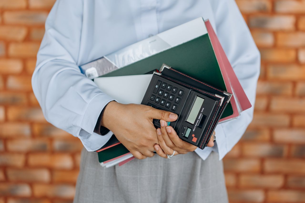 Consumer reviewing a monthly budget before speaking with a debt counsellor near me